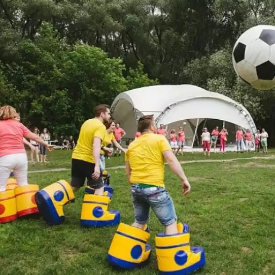 Group of people playing foot golf on a course in Prague.